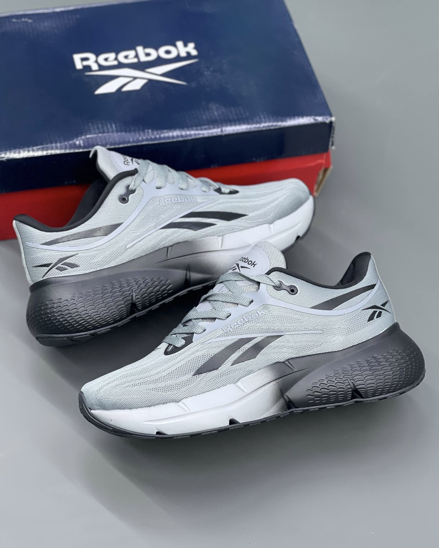 کفش کتونی مردانه ریباک زیگنیشن Reebok Zignition Running Shoes طوسی