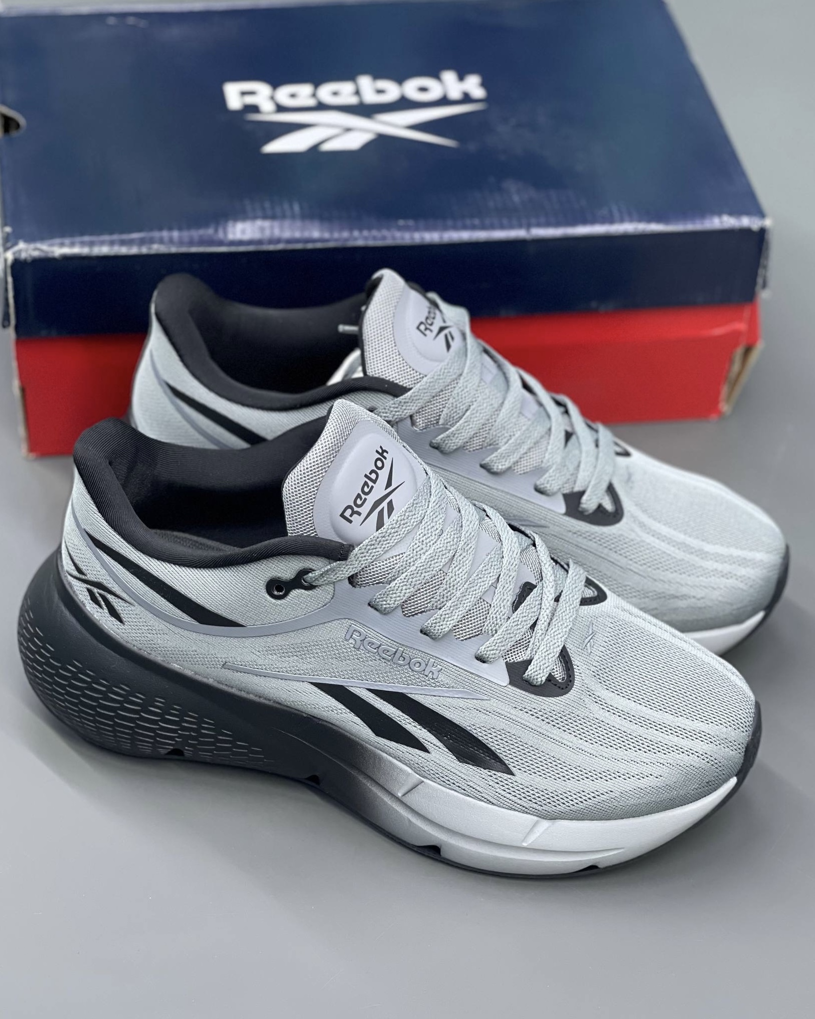 کفش کتونی مردانه ریباک زیگنیشن Reebok Zignition Running Shoes طوسی